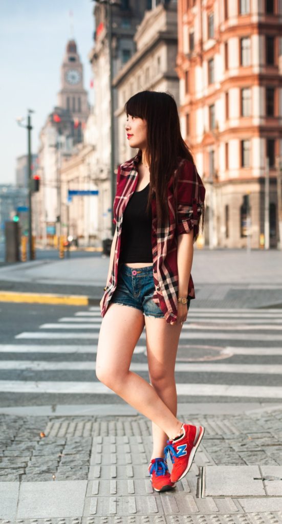 female expressing personal fashion style in shorts 